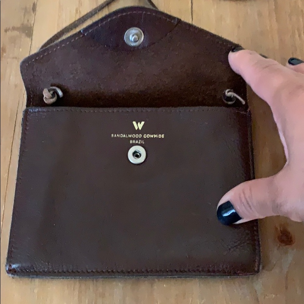 Brown mini leather crossbody bag.